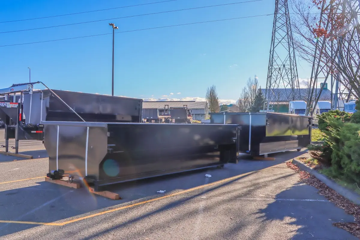 Roll-off dumpster ready for waste disposal at job site for Construction Dumpster Rental in West Dundee